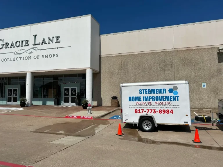 Stegmeier crew and trailer at a commercial storefront cleaning job in DFW