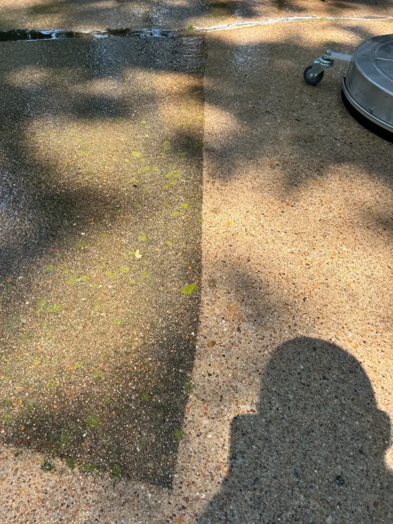Concrete showing a clean line where stains were removed