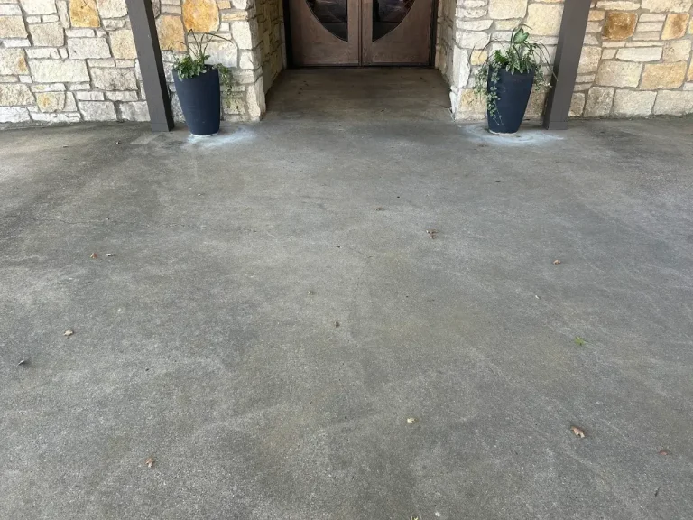 Front porch concrete after pressure washing